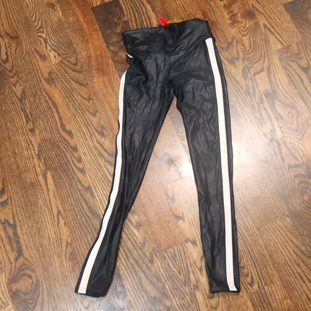 Spanx faux leggings with cream colored stripe on each side.  Size small
